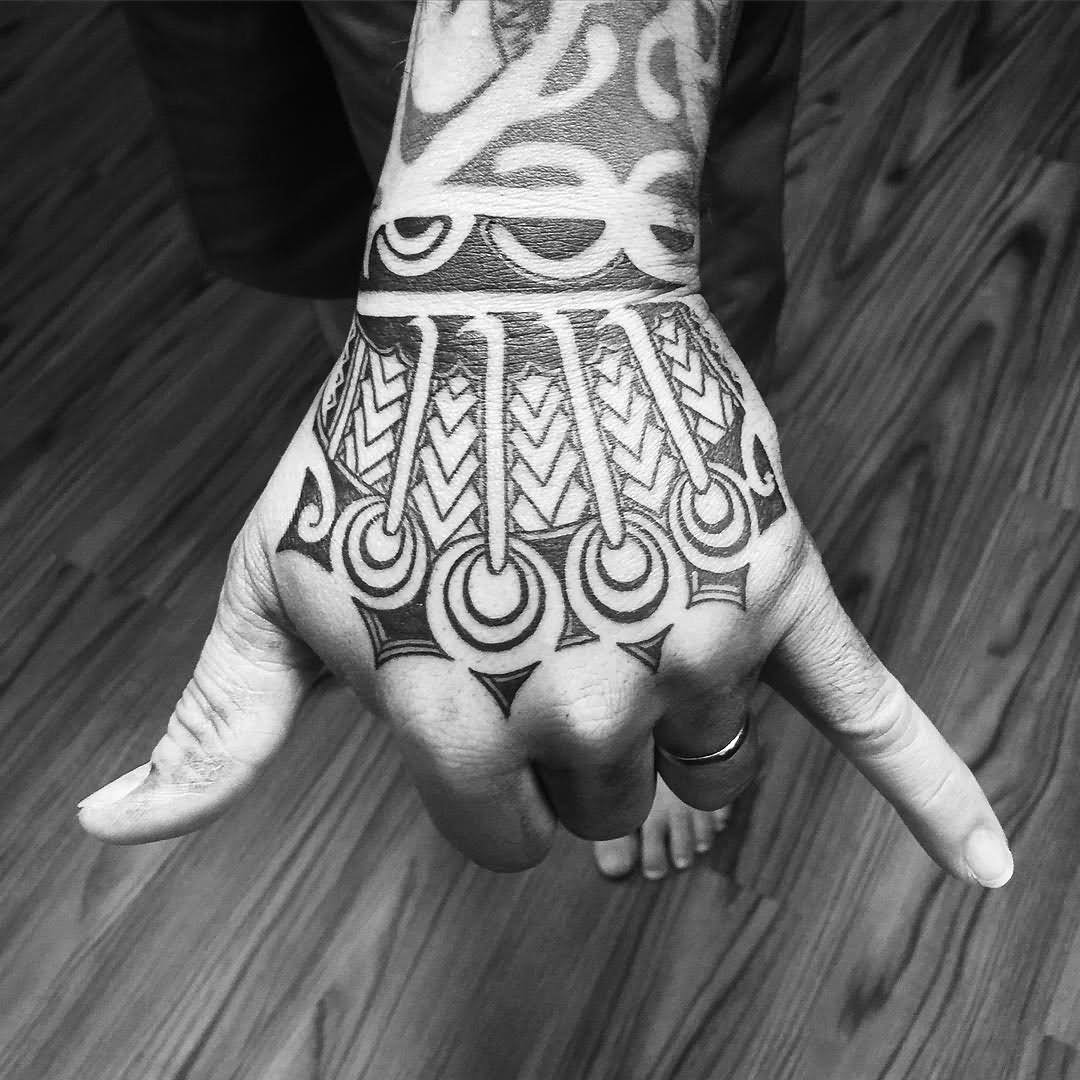 Black Ink Ancient Hawaiian Design Tattoo On Hand
