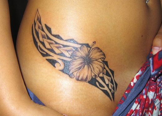 Black Ink Ancient Hawaiian Flower Tattoo Design For Side Rib