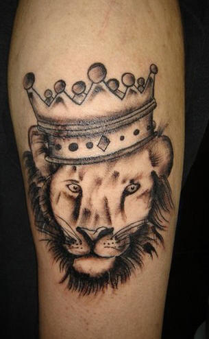 Black Ink Crown On Leo Head Tattoo Design For Arm