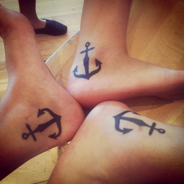 Black Ink Friendship Anchor Tattoos On Heel