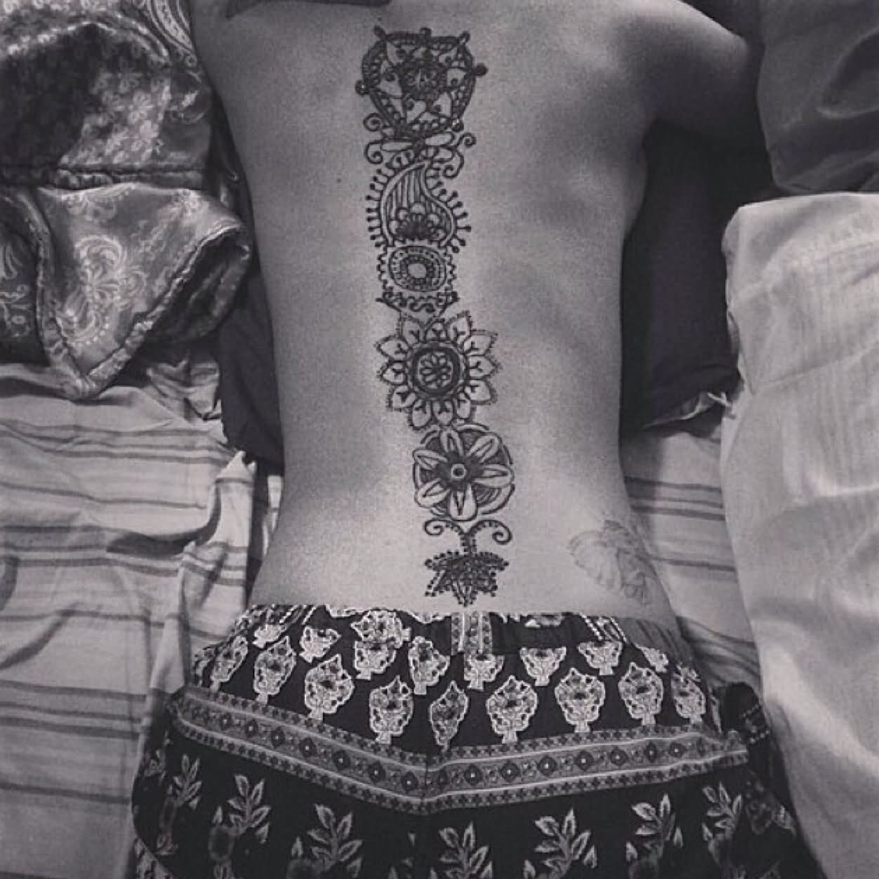 Black Ink Hippie Flowers Tattoo On Full Back