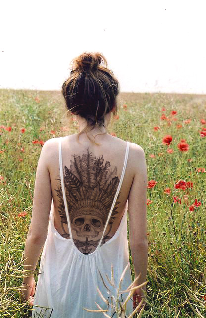 Black Ink Hippie Skull Tattoo On Girl Back
