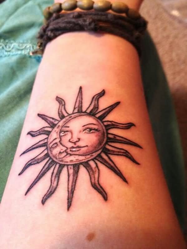 Black Ink Hippie Sun With Half Moon Tattoo Design For Forearm