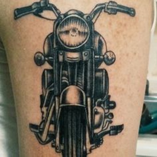 Black Ink Motorcycle Tattoo On Left Bicep