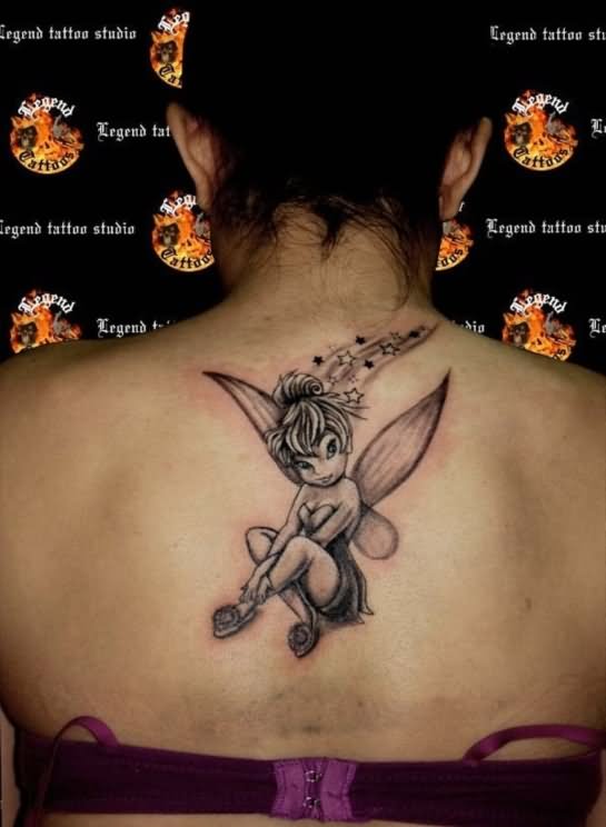 Black Ink Tinkerbell Tattoo On Girl Upper Back