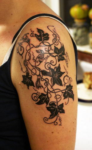 Black Leaves Vine Tattoo On Left Shoulder