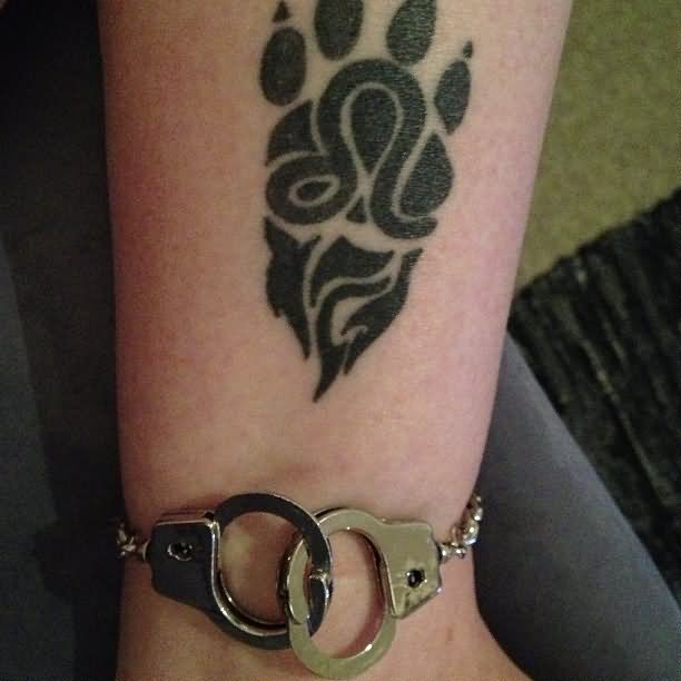 Black Leo Symbol With Paw Print Tattoo Design For Arm