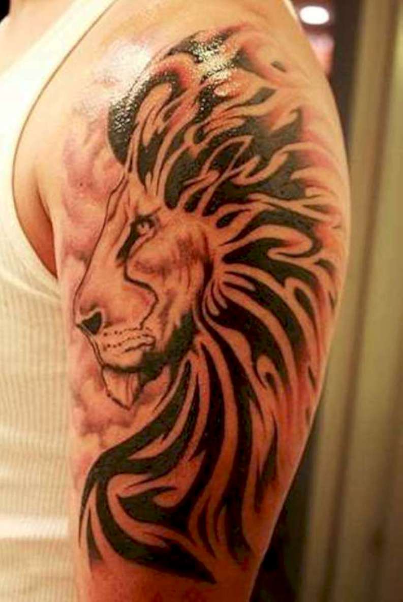 Black Leo Tattoo On Guy Left Half Sleeve
