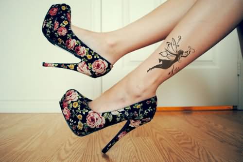 Black Tinkerbell Tattoo On Girl Left Leg