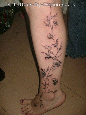 Black Vine Tattoo On Left Leg