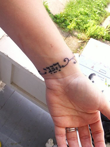 Classic Hebrew Lettering Tattoo On Wrist