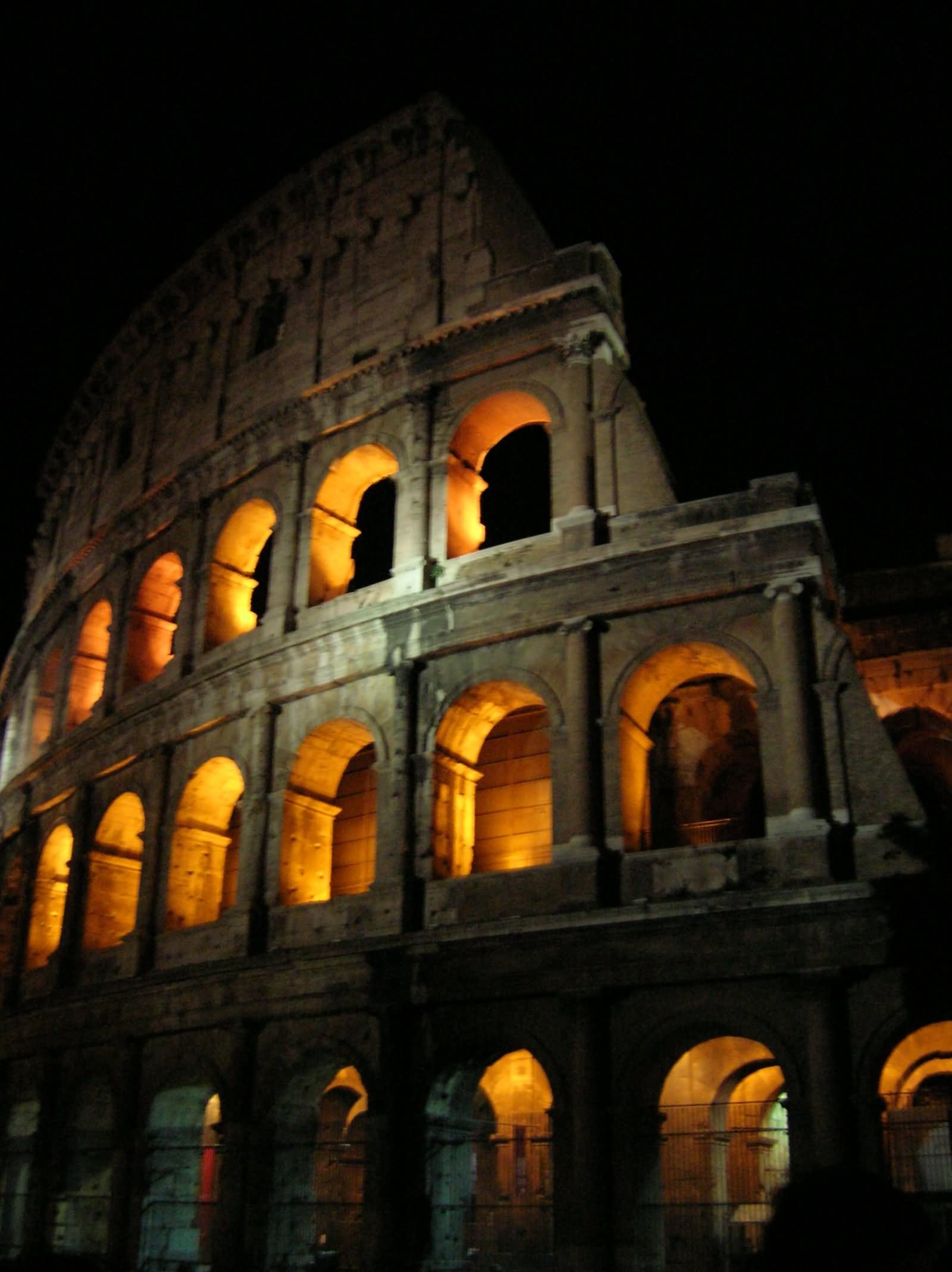 Closeup View Of The Colosseum At Night