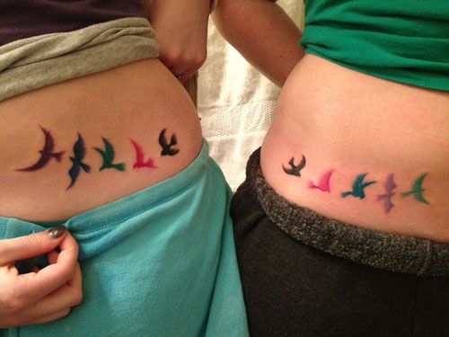 Colored Flying Birds Tattoos On Waist