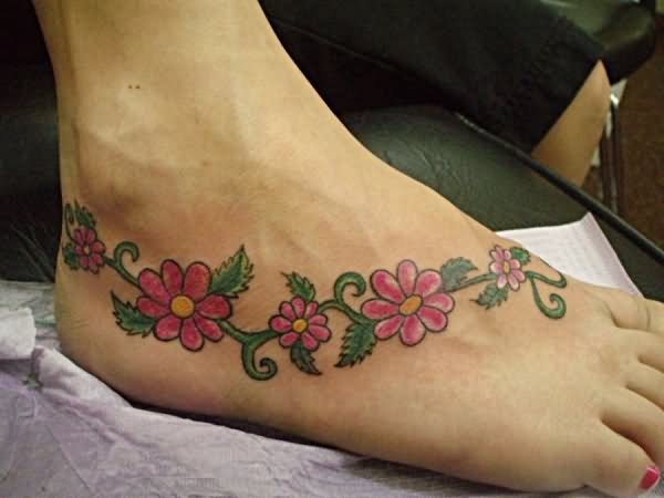 Colorful Hippie Flowers Tattoo On Girl Foot