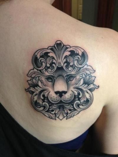 Cute Black And Grey Leo Tattoo On Right Back Shoulder