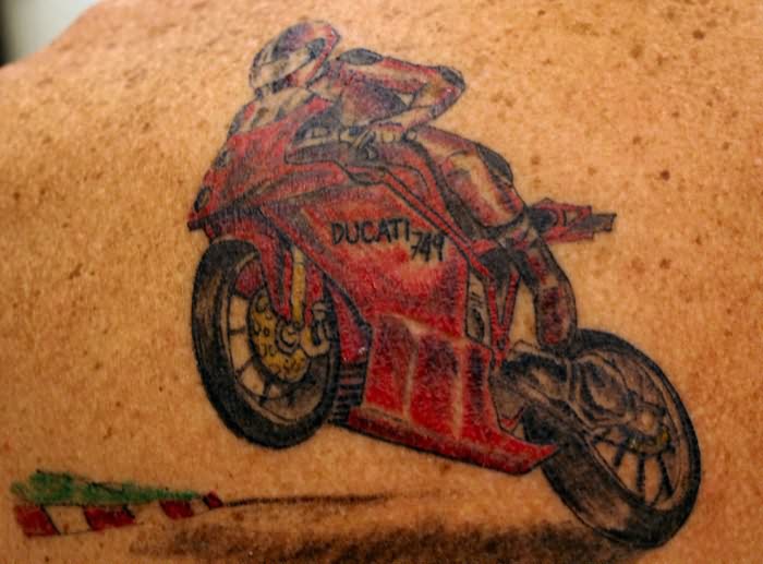 Ducati Motorbike Tattoo On Upper Back