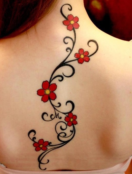 Flower Vine Tattoo On Girl Upper Back