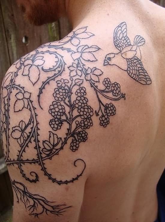 Flowers Vine With Flying Bird Tattoo On Man Left Back Shoulder
