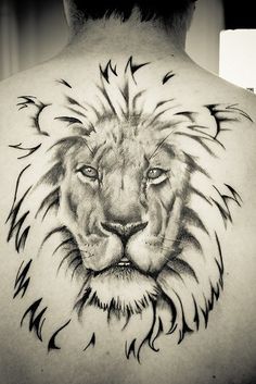 Grey Ink Leo Tattoo On Guy Upper Back