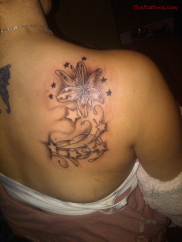 Grey Ink Hippie Flower With Stars Tattoo On Right Back Shoulder