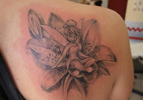 Grey Ink Tinkerbell With Flower Tattoo On Right Back Shoulder