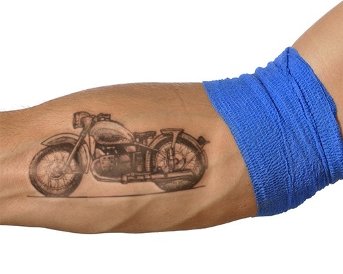 Grey Ink Vintage Motorcycle Tattoo On Forearm