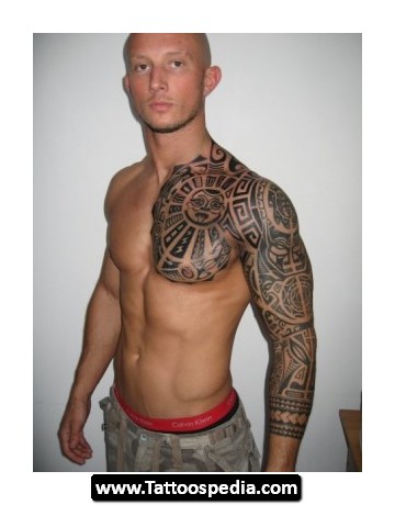Hawaiian Design Tattoo On Man Left Full Sleeve And Chest