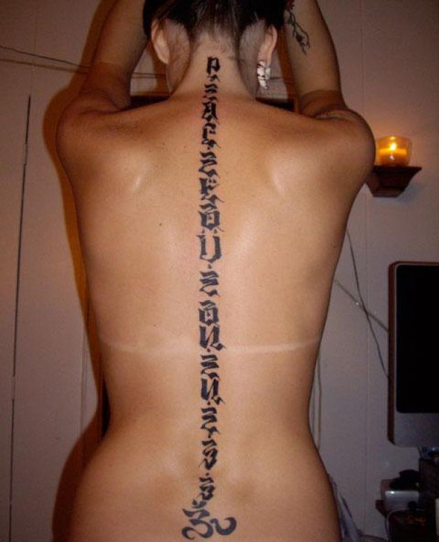 Hebrew Lettering Tattoo On Girl Full Back