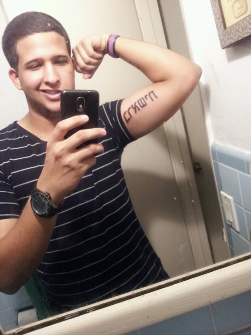 Hebrew Lettering Tattoo On Man Right Bicep