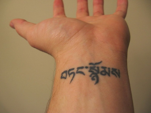 Hebrew Tattoo On Left Wrist