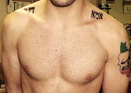 Hebrew Tattoo On Man Collarbone