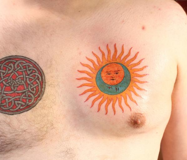 Hippie Sun Tattoo On Man Chest