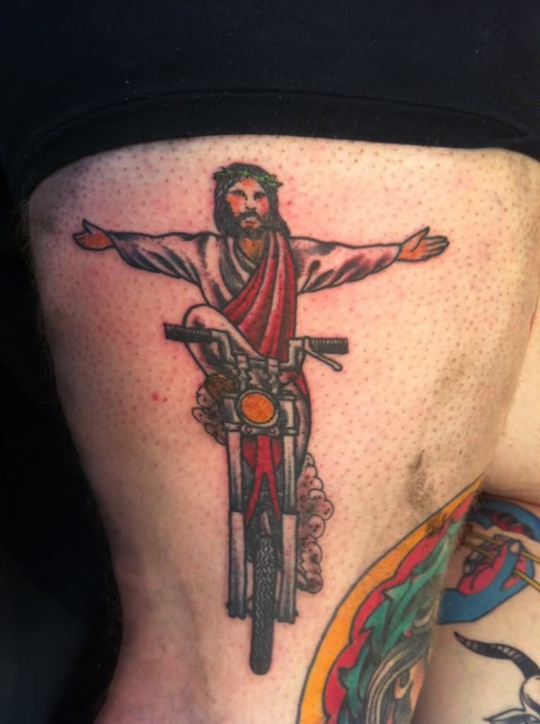 Jesus On Motorcycle Tattoo On Left Sleeve