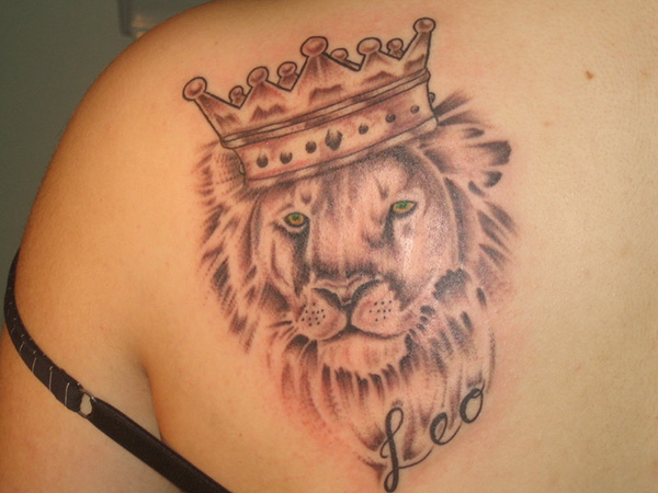 Leo - Black Ink Crown On Lion Head Tattoo On Guy left Back Shoulder