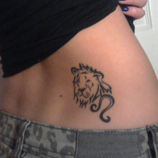Leo Symbol With Lion Head Tattoo On Girl Lower Back