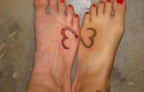 Nice Heart Shape Symbol Tattoos On Feet
