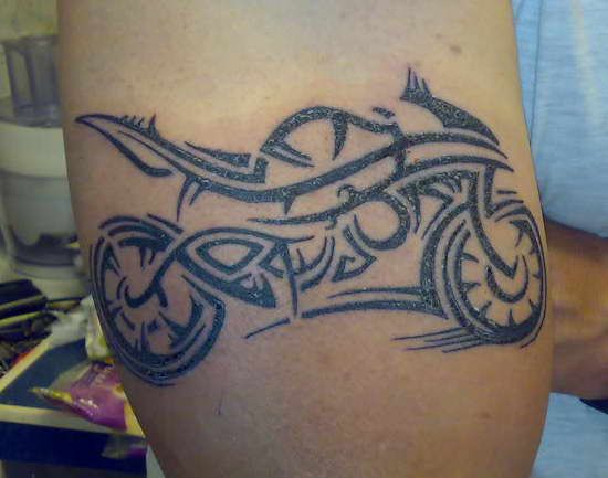 Outline Tribal Motorcycle Tattoo On Bicep