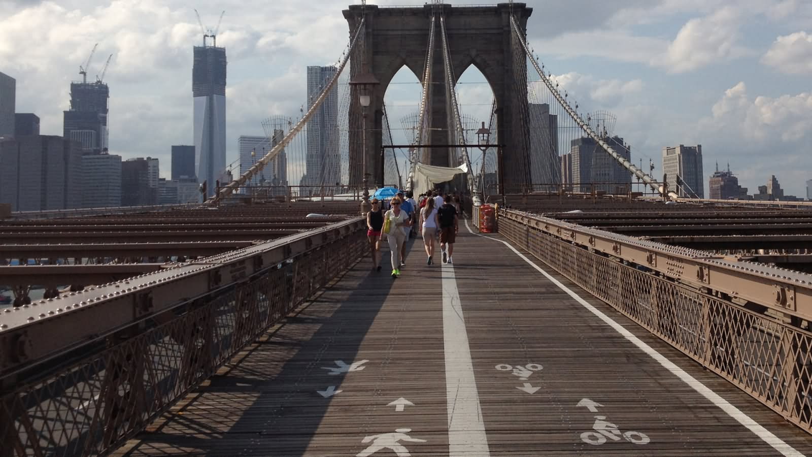 People Walking On The Brooklyn Bridge