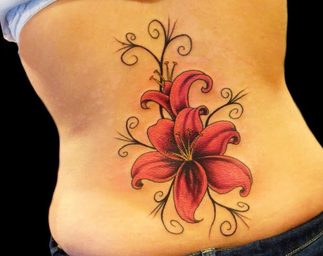 Pink Hawaiian Flower Tattoo On Lower Back