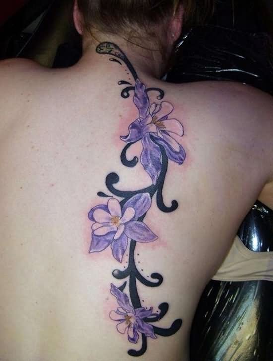 Purple Flowers With Vine Tattoo On Girl Right Back Shoulder