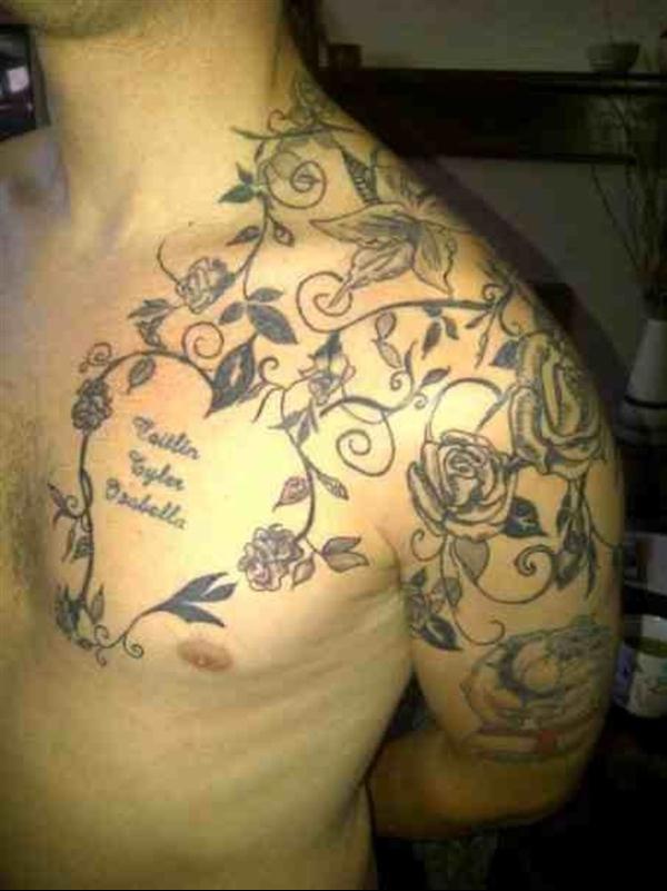 Rose Vine Tattoo On Man Left Upper Shoulder