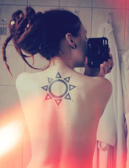 Simple Hippie Sun Tattoo On Girl Upper Back