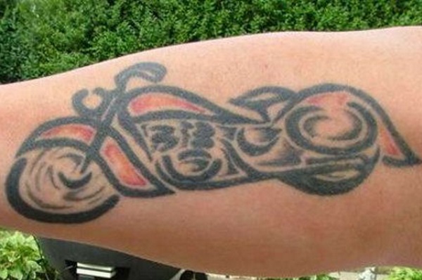 Tribal Motorcycle Tattoo On Forearm