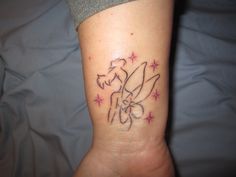 Unique Black Outline Tinkerbell Tattoo Design For Wrist