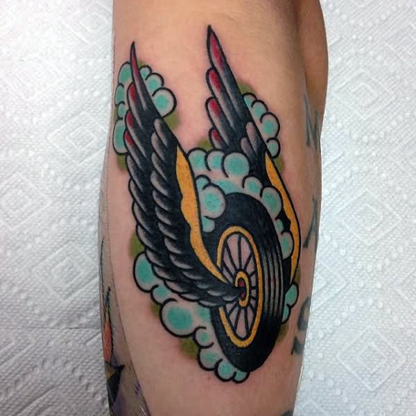 Winged Motorcycle Wheel Tattoo