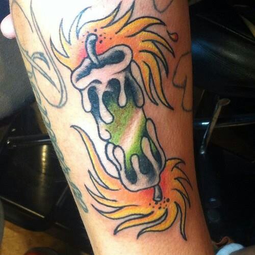 Amazing Candle Burning at Both Ends Tattoo Design