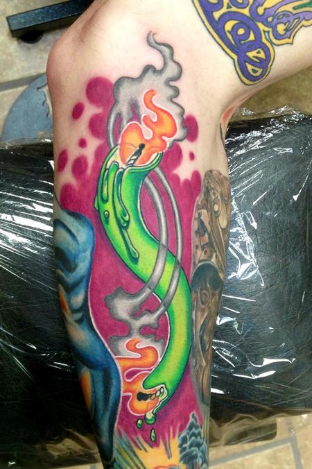 Amazing Green Bent Candle Burning at Both Ends Tattoo on arm