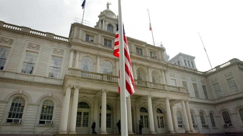 American Flag In Front Of New York City Hall
