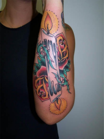 Awesome Candle Burning at Both Ends Tattoo on Forearm