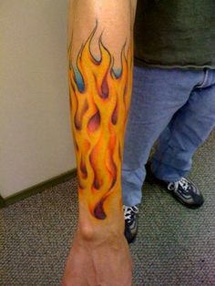 Awesome Fire And Flame Tattoo On Man Right Forearm